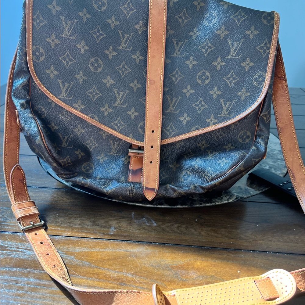 Louis Vuitton Saumur 35 priced to sell.